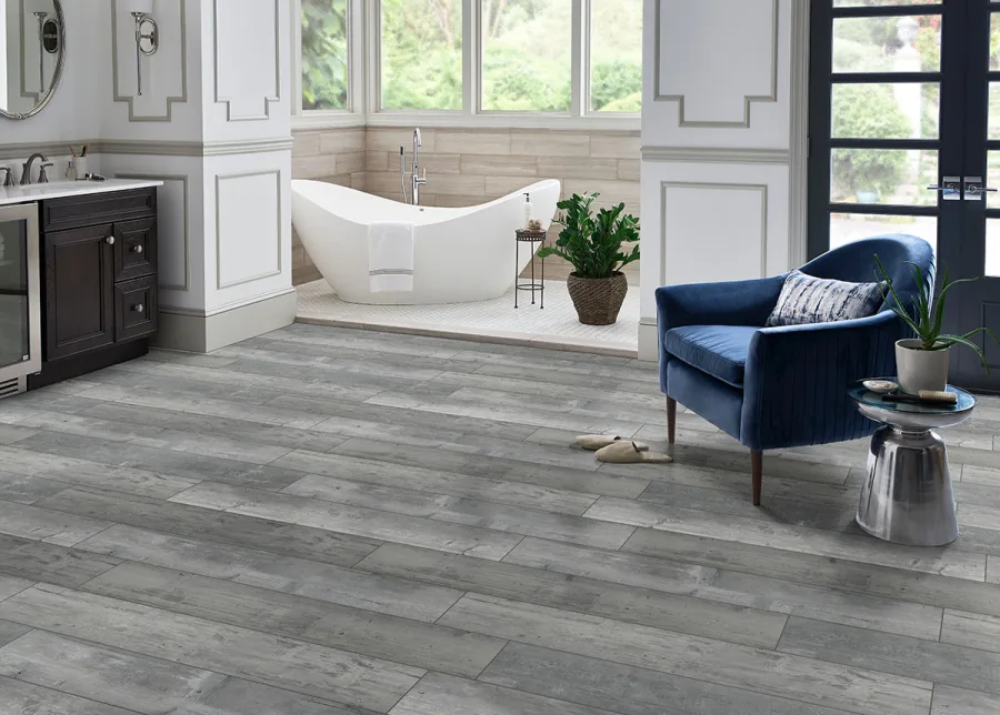 Flooring material samples — hardwood, LVP, tile, and carpet