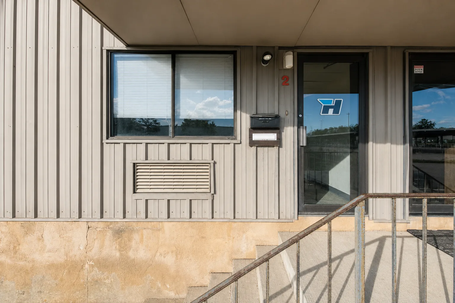Front entrance of the Heck Design Group studio at 1368 Hooksett Rd