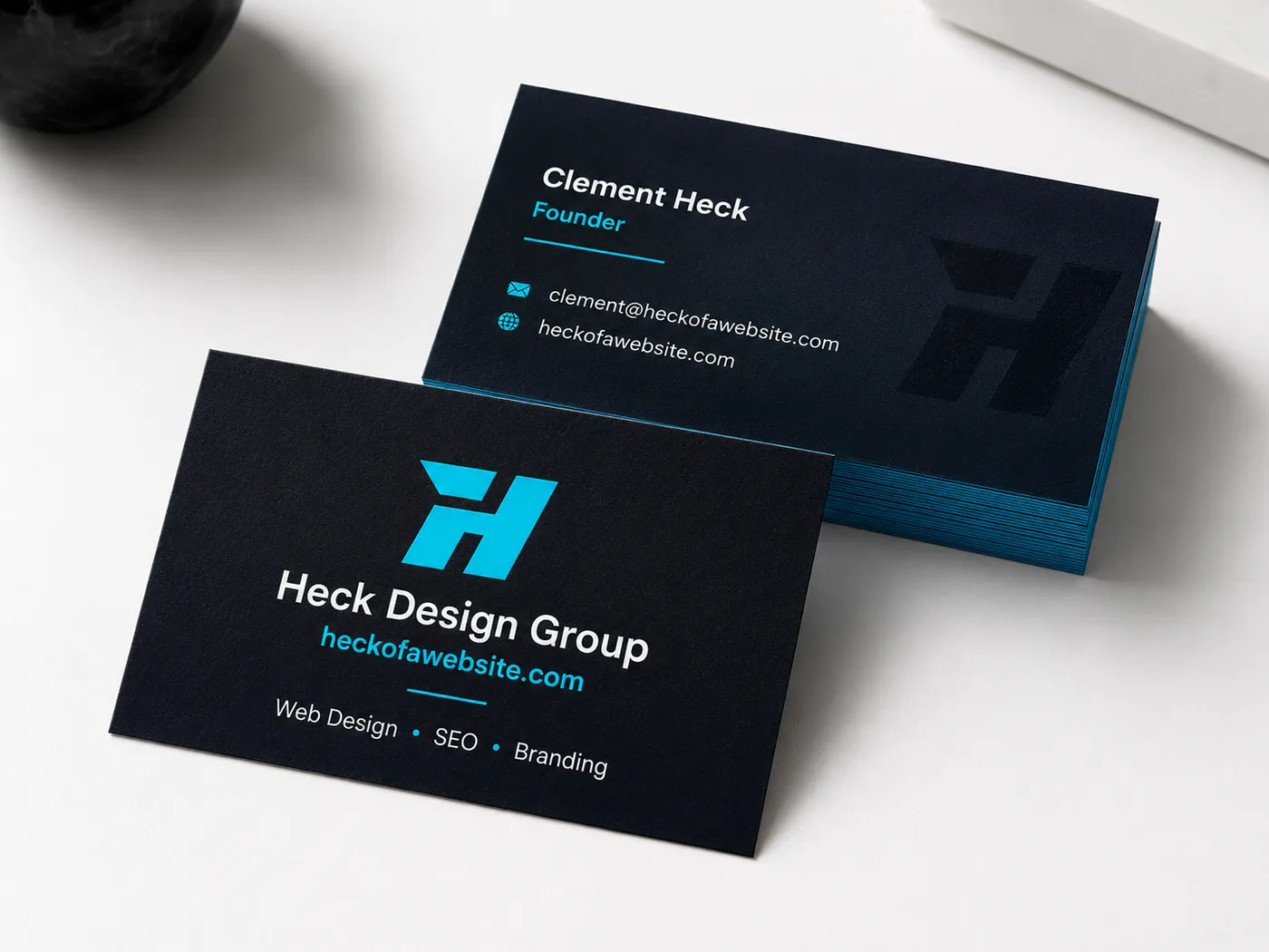 Branded business cards designed by Heck Design Group