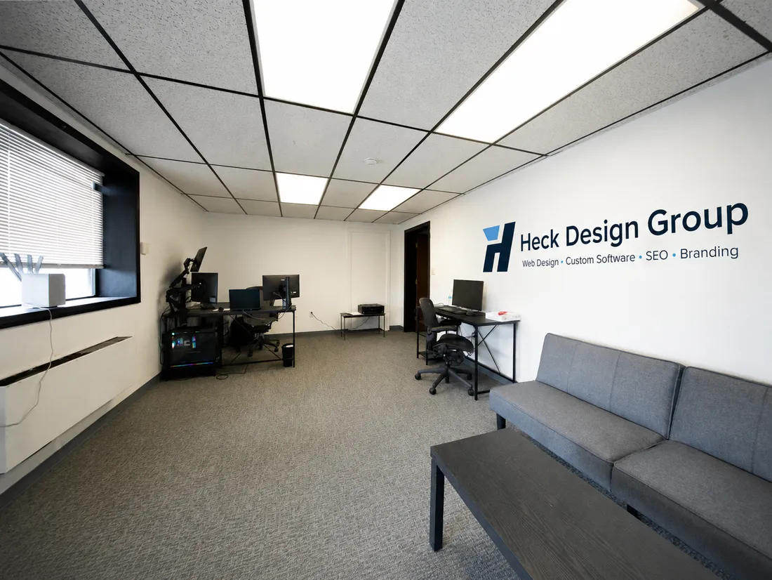 Custom branded wall banner installed in a workspace
